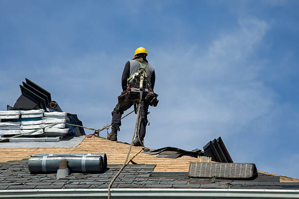Professional Roof Replacement technician working in Roxbury, VT